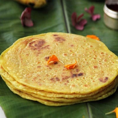 Kova Bakshalu - Soft dough wrapped around a rich, creamy Kova filling, a traditional Indian sweet flavored with cardamom.