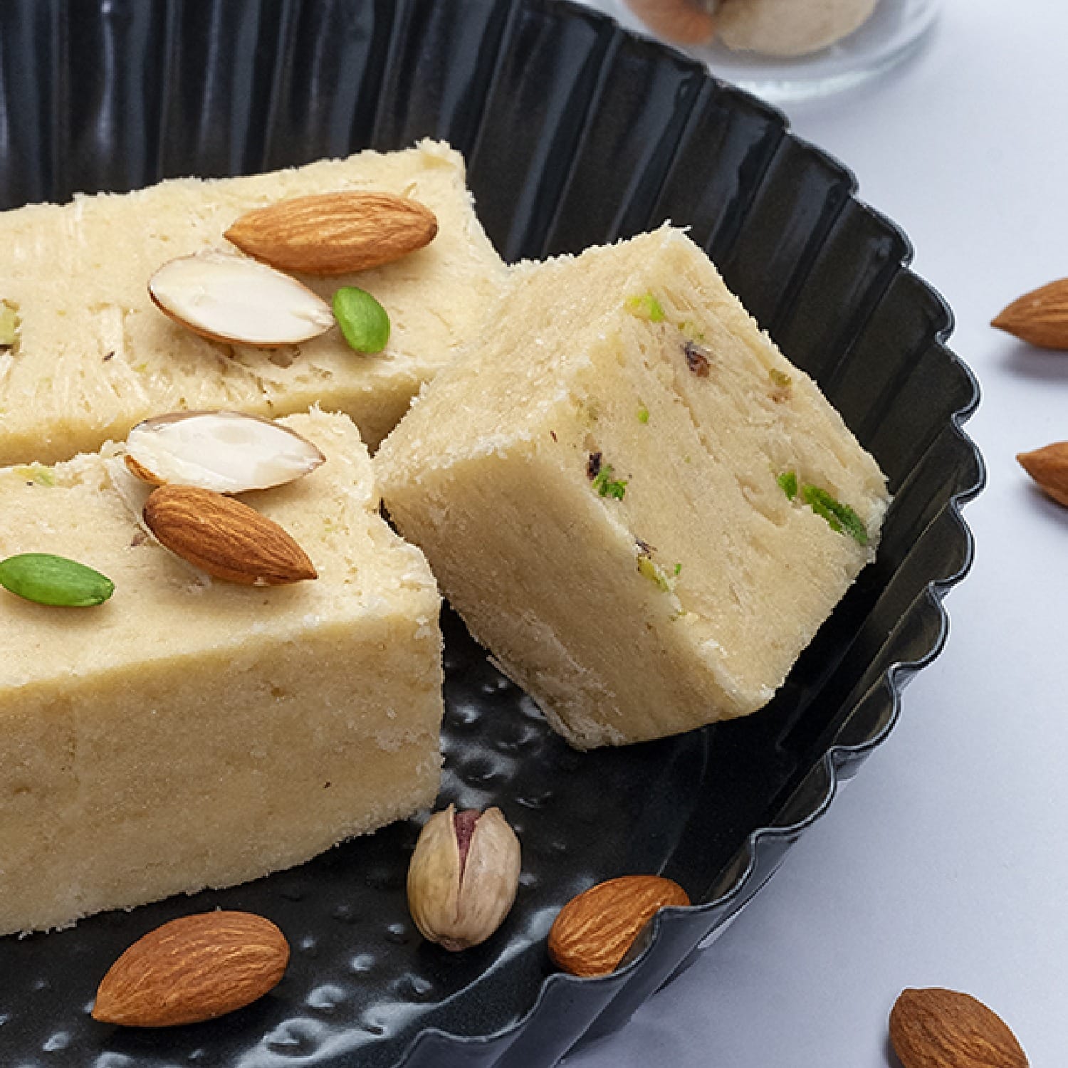 Sone Papdi (Besan) Yellow - Crispy, flaky Indian sweet made with gram flour, sugar, and ghee, perfect for festivals and gifting.